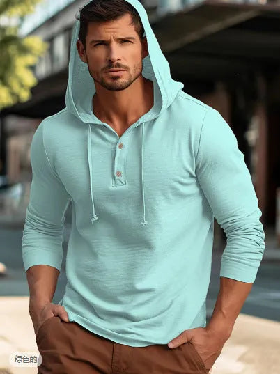 Cotton pullover sports hoodie in apricot colour on a hanger.