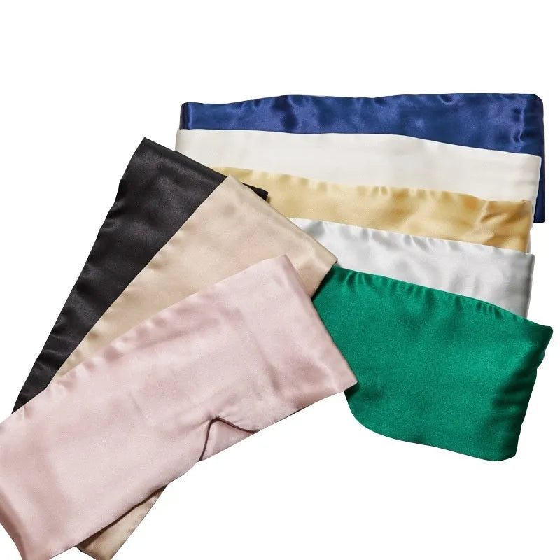 Mulberry silk sleep eye mask shown in multiple colour options on neutral background