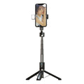 Bluetooth selfie stick with double fill light extended on desktop showing aluminium alloy arm and stand base
