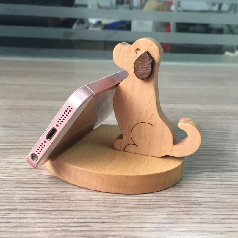 Solid beech wood mobile phone holder with decorative resin animal figure on wooden base
