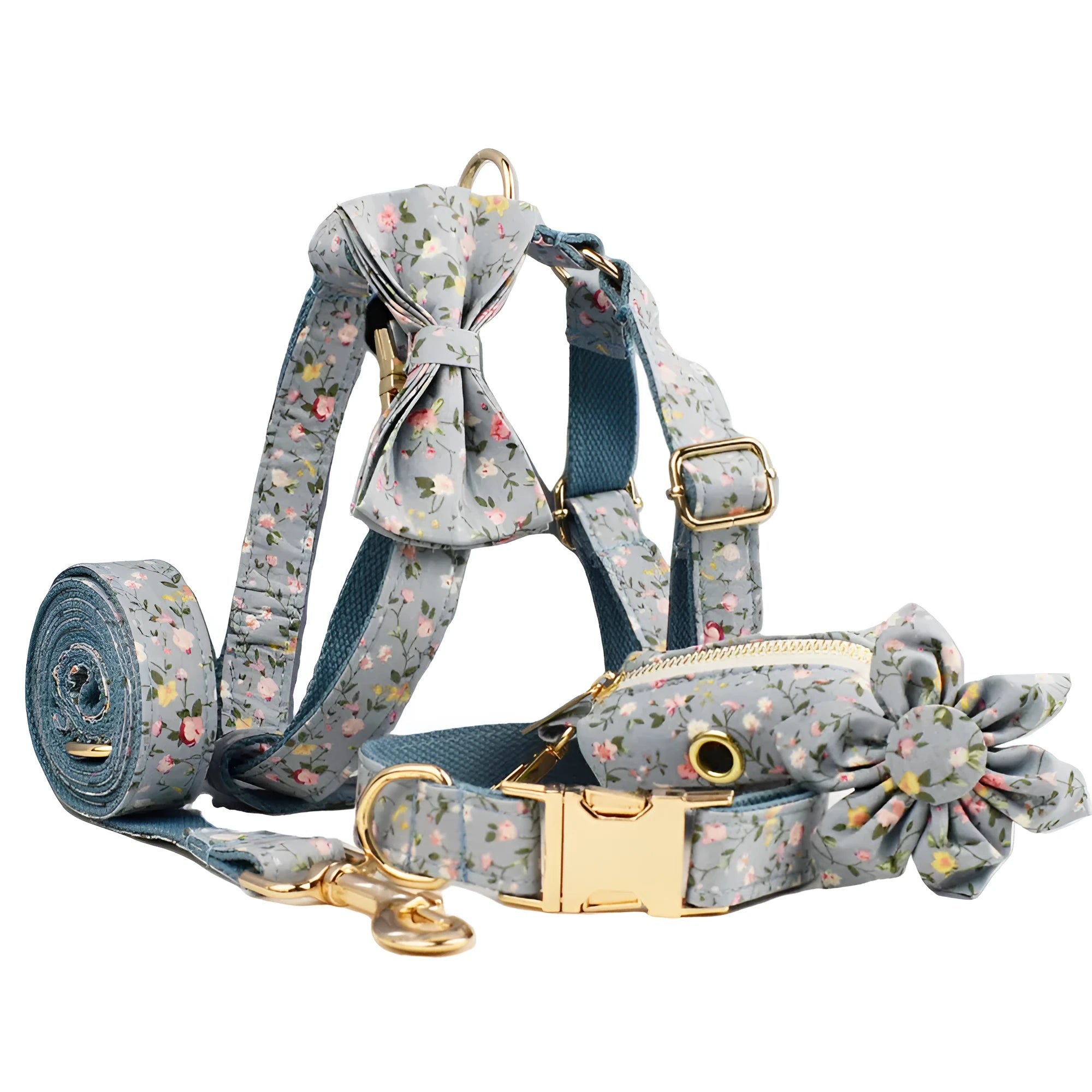 Blue floral patterned dog collar and matching leash, vest, and bow set on a white background.