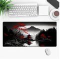 Large custom anime print gaming mouse pad on a desk with keyboard and mouse.