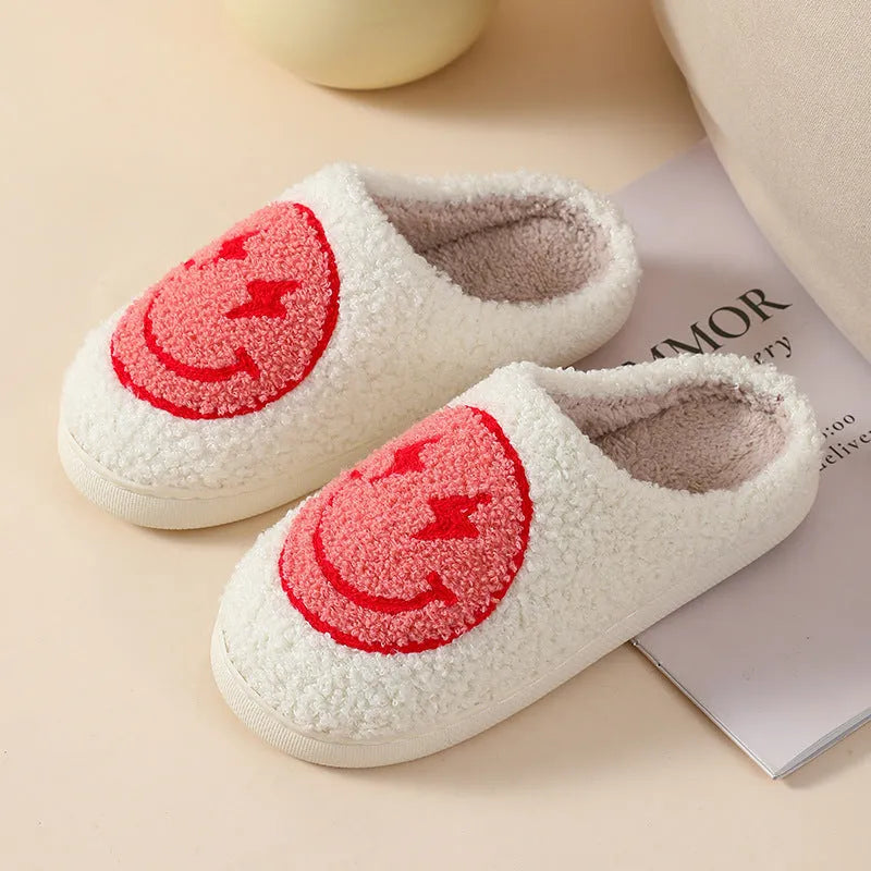 Plush cartoon love style slippers for women with non-slip PVC soles in multiple colours.