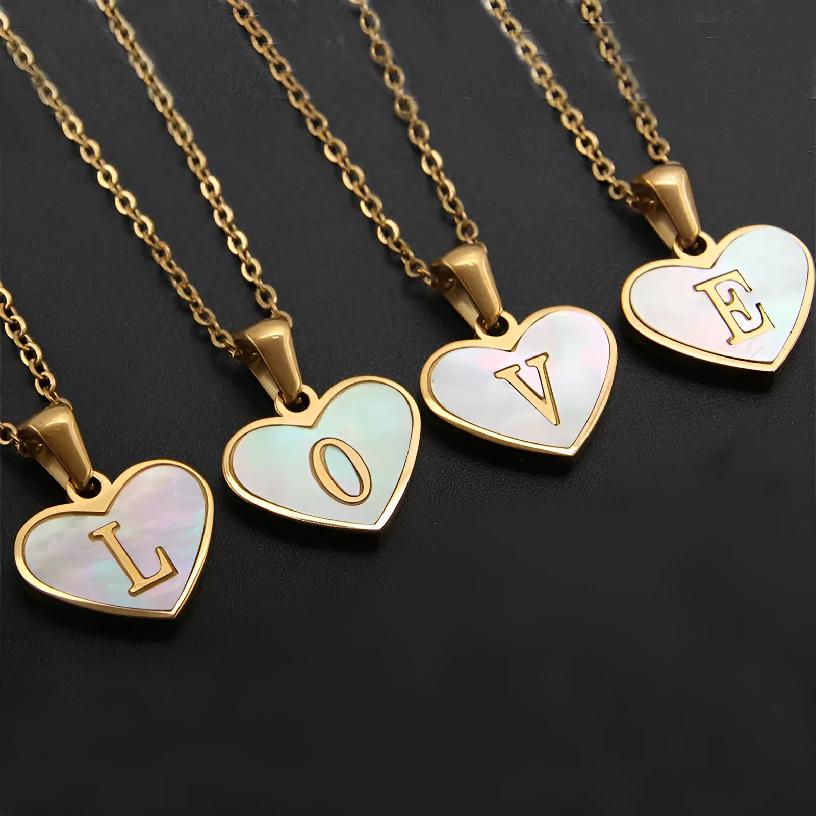 Gold heart necklace with white shell pendant and initial charm on 45cm adjustable chain