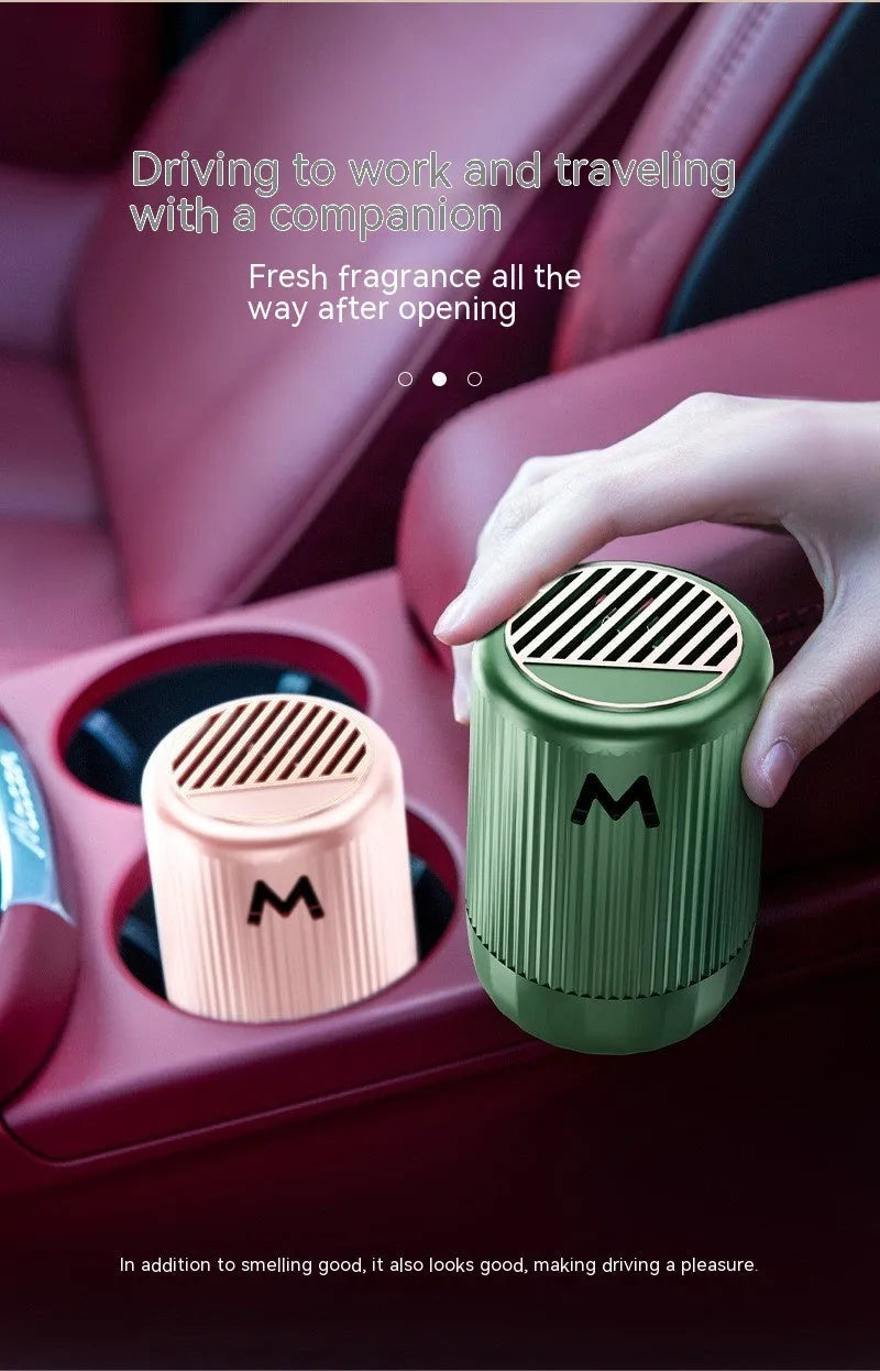 Solid car and home aromatherapy decoration cup in choice of four scents, dimensions 10 by 6 centimetres.