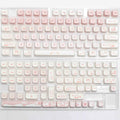 Full set of PBT sublimation dye printed keycaps for a mechanical keyboard, showing various coloured keys.