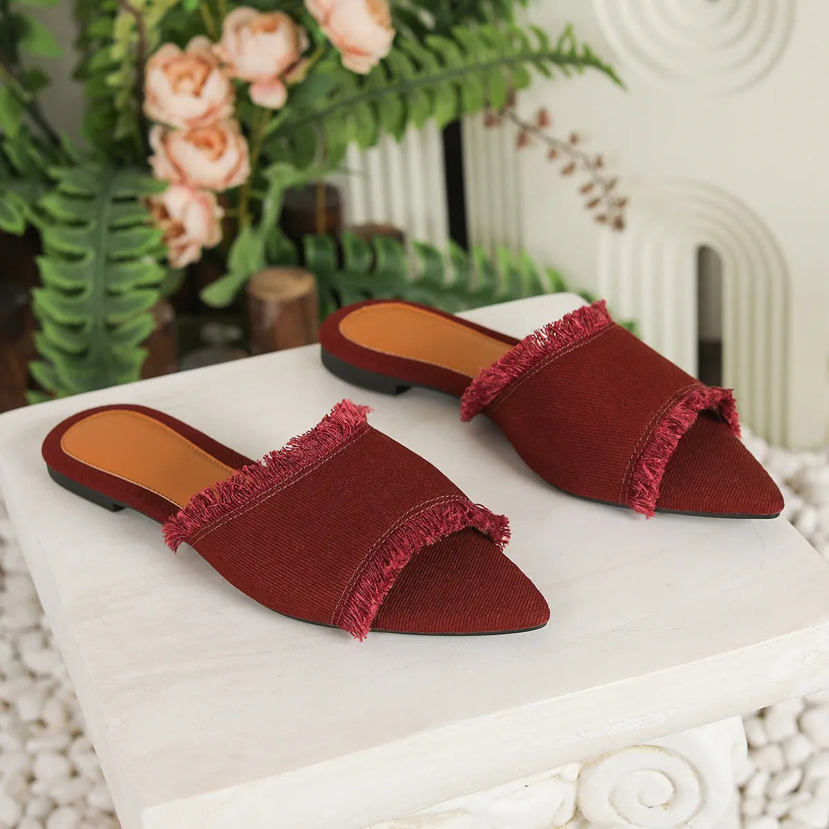 Women's denim flat slippers with tassel detail and leather lining in multiple colour options