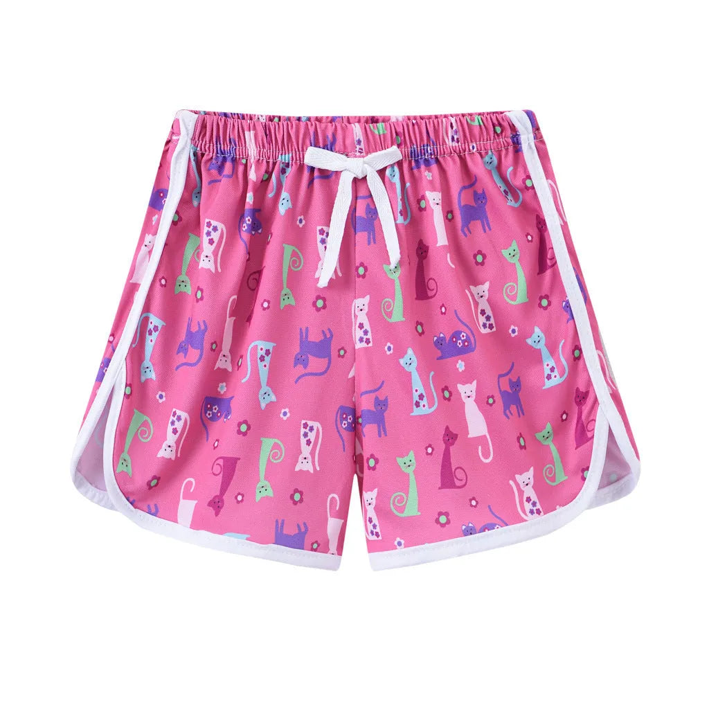 Children's casual polyester shorts in assorted colours and prints like pineapple, kitten, and stripes for beach wear.