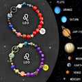 Set of two natural stone beaded bracelets featuring engraved zodiac sign charms.