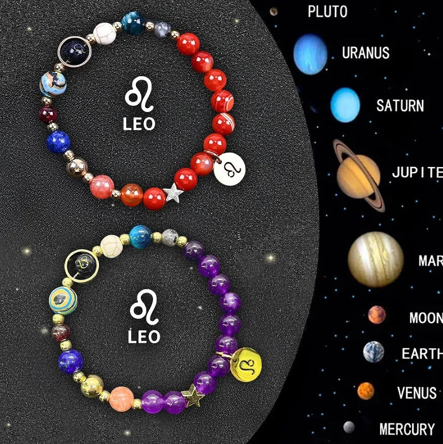 Set of two natural stone beaded bracelets featuring engraved zodiac sign charms.