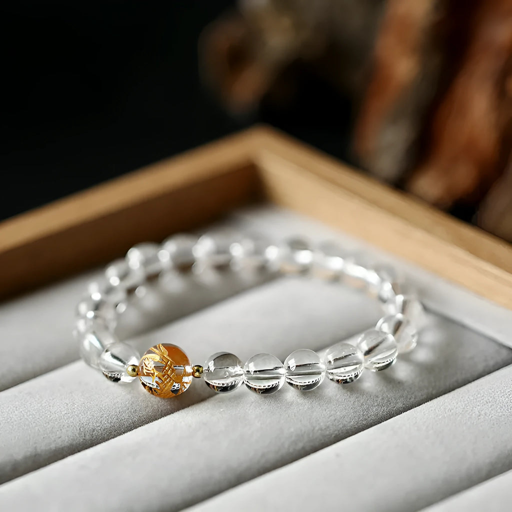Geometric obsidian and white crystal bracelet with black agate beads and golden dragon centrepiece for 14-16cm wrists