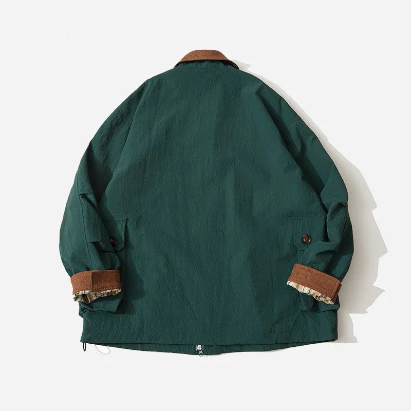 Green casual jacket with side seam pockets on a hanger