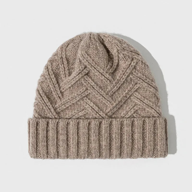 Wool knitted dome hat with totem pattern in ivory white, shown from side angle