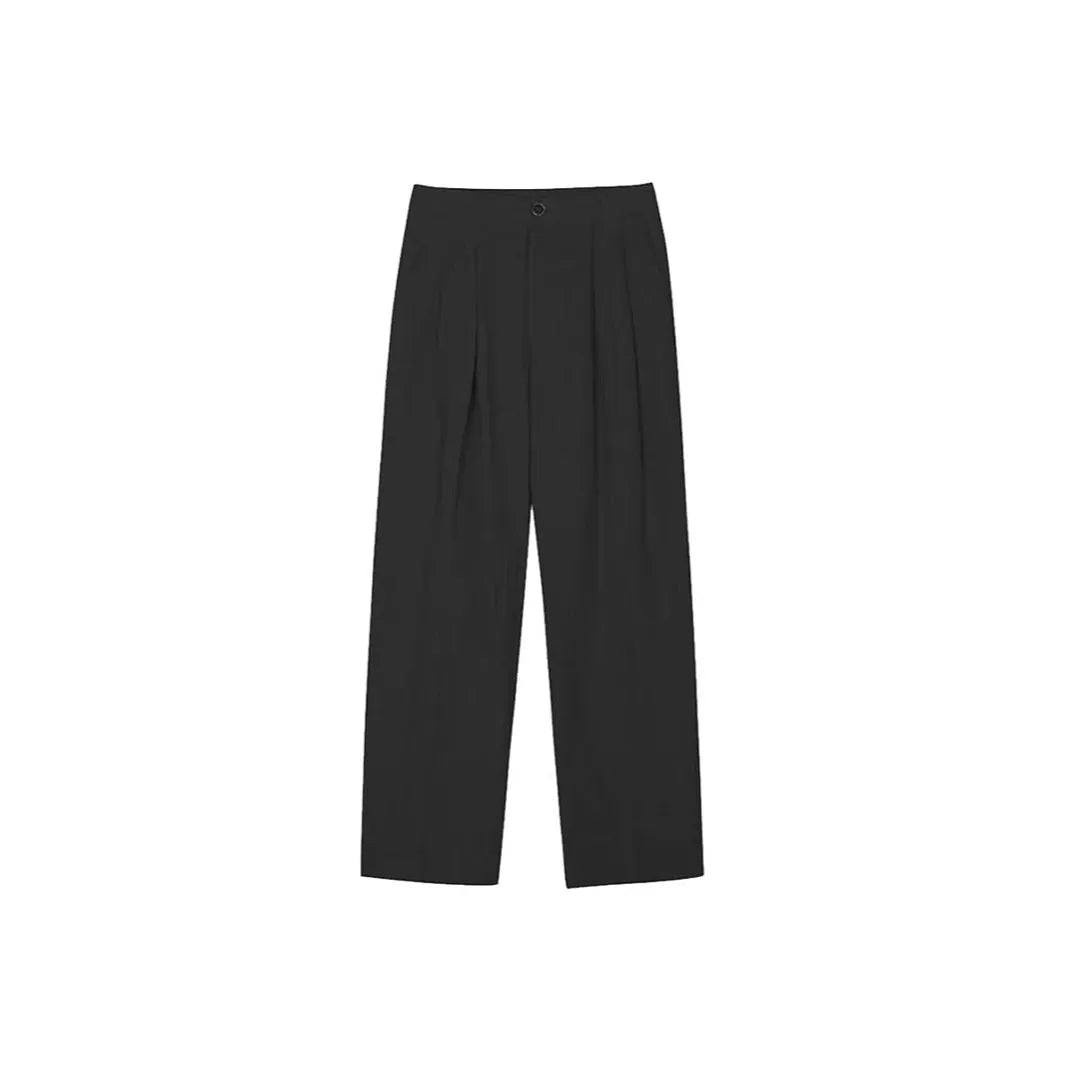 Men's light-weight apricot coloured cotton linen trousers with a loose Korean fit and pencil leg opening.