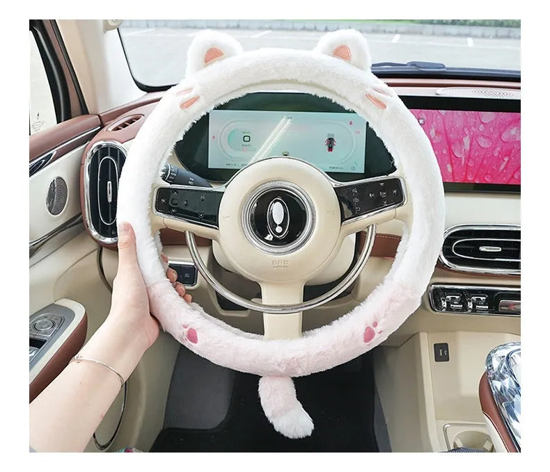 Plush winter steering wheel cover with cartoon embroidery, shown in 38cm size on a car steering wheel.