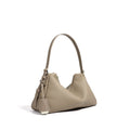 First layer cowhide leather pillow shape handbag in elephant gray with shoulder strap and open outer pocket