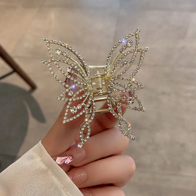 Butterfly hair barrettes in alloy with rhinestone or pearl styles measuring 6.7x6.2cm