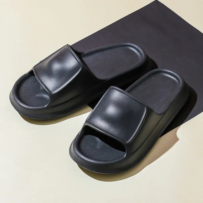 A pair of thick-soled EVA foam flip-flop slippers in a choice of seven colours on a plain background.