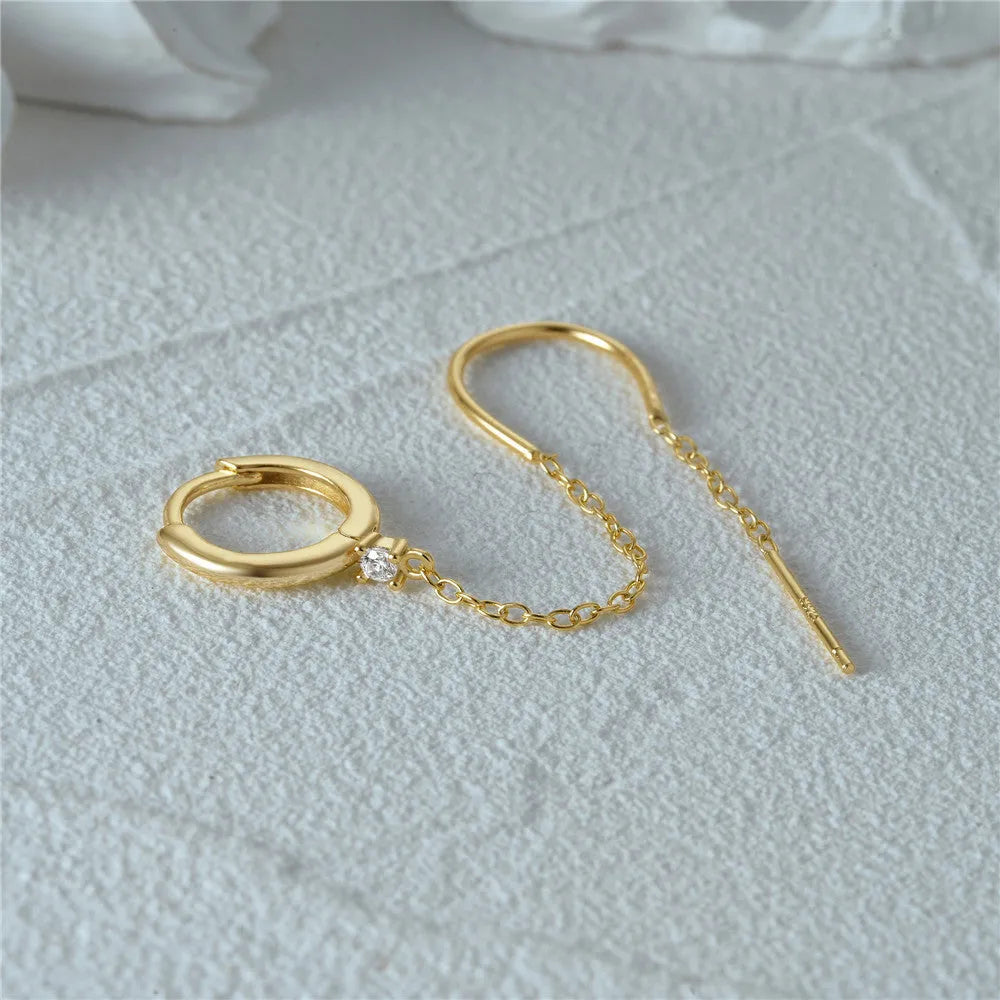 S925 sterling silver ear clip studs with flower, tassel and chain design in golden electroplated finish
