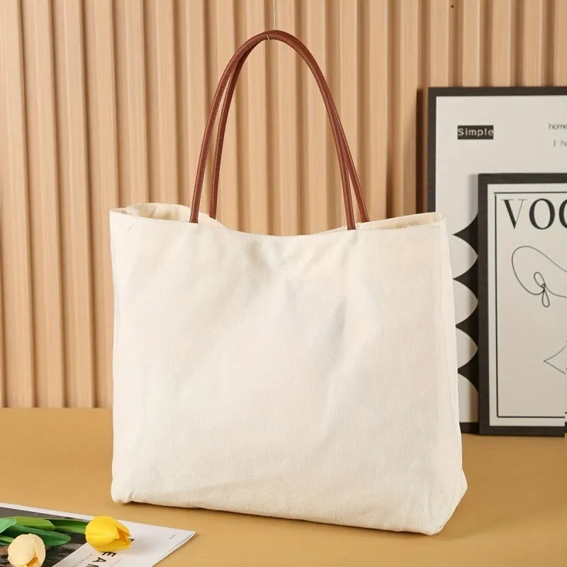 Natural cotton canvas tote bag with zip closure and double shoulder straps in beige white colour