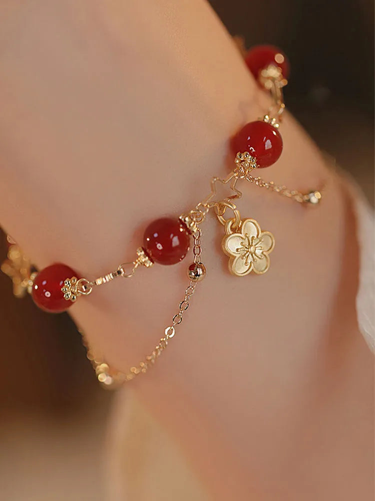 Women's double layer bracelet with natural red agate and peach blossom floral design in red colour
