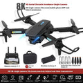 Black S138 carbon fibre appearance folding UAV drone with dual cameras for obstacle avoidance aerial photography.