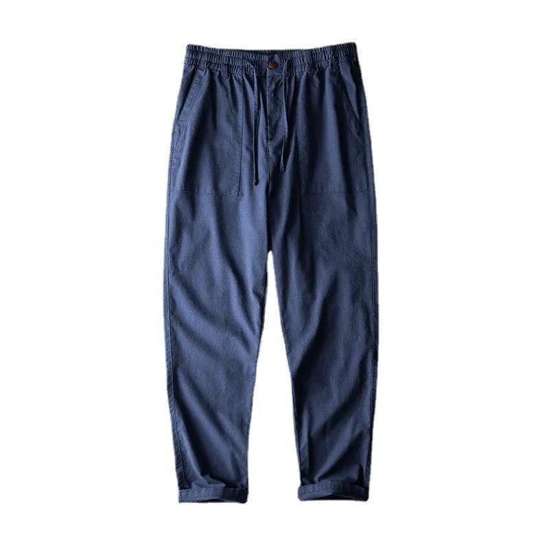 Men's solid colour linen trousers in mid waist design available in three colour options
