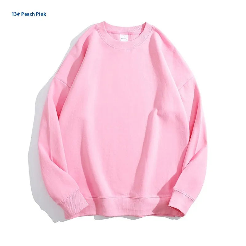 Cotton off shoulder loose pullover sweater in a solid colour with round neck and long sleeves.