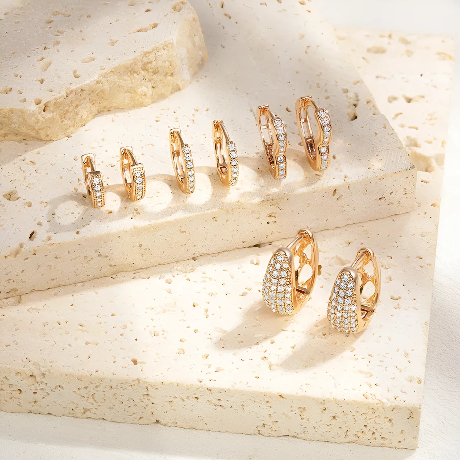 Brass electroplated copper ear clip earrings with heart shape zircon stone design in gold colour