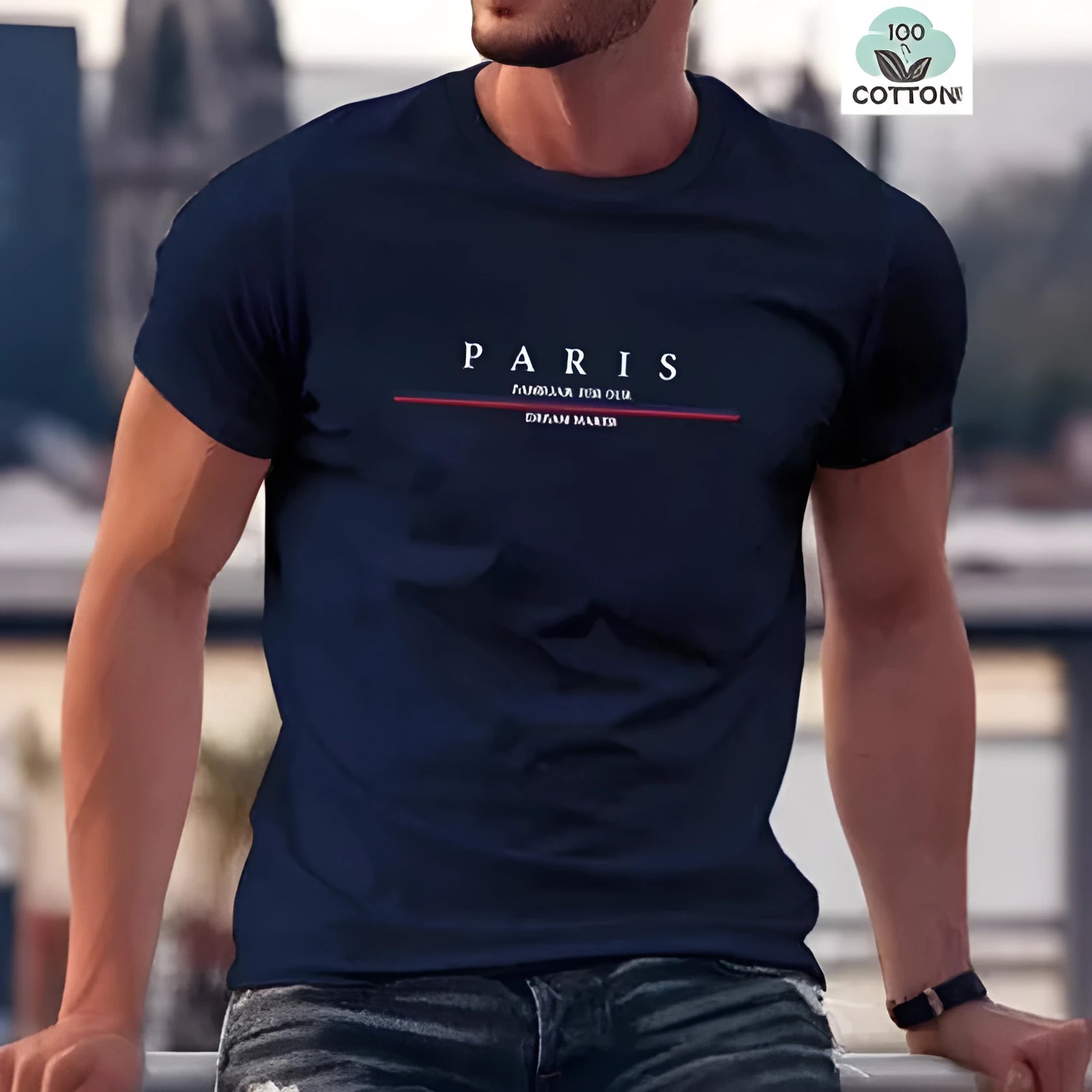 Man wearing a loose fit apricot coloured short-sleeved T-shirt with a black letter print on the front.