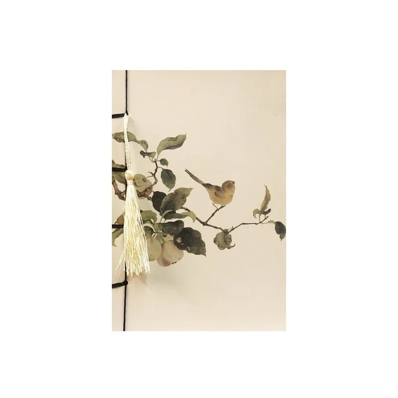 A5 antique art notebook with wire binding, decorative tassels, and traditional Chinese painting cover design
