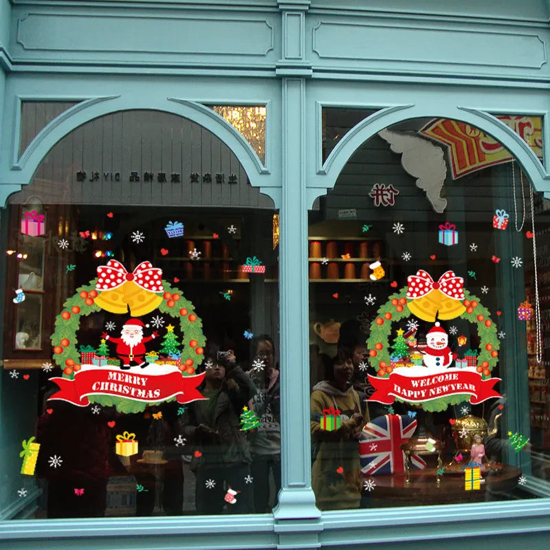 Two large 60x45cm colourful Christmas wall stickers with cartoon designs for electrostatic window application.