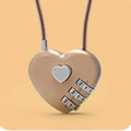 Peach heart shaped combination lock with a black steel rope cable coiled on a table.